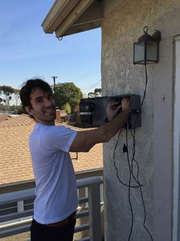 Nick Burant installs CCA's first air monitor